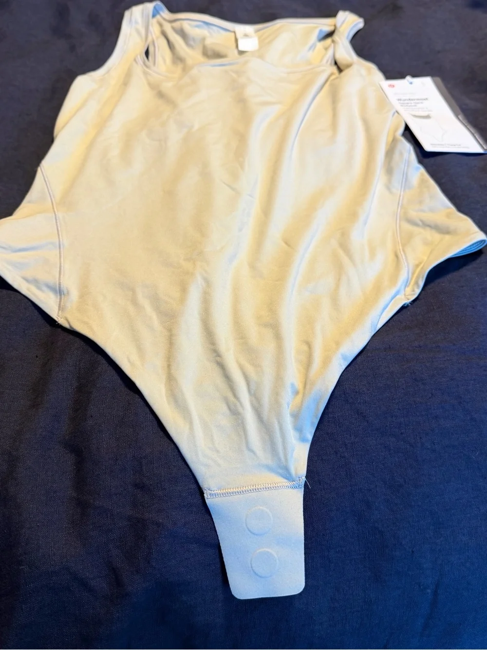 lululemon athletica Kids Sleeveless One-Piece Bodysuit in Cream